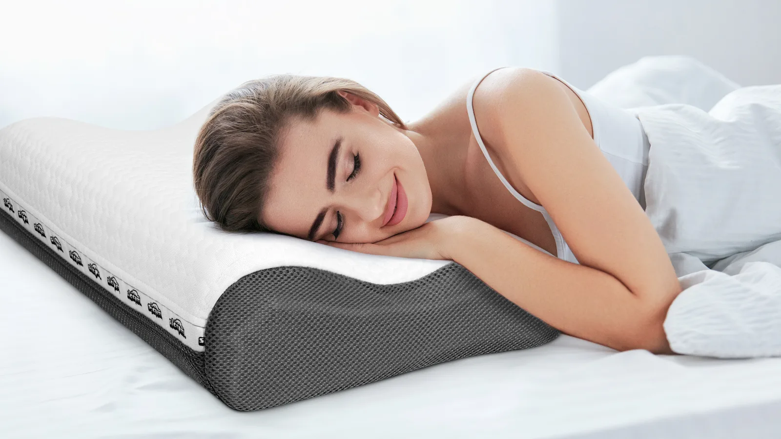 Persona que duerme de lado apoyada en la almohada Sleepm Camel