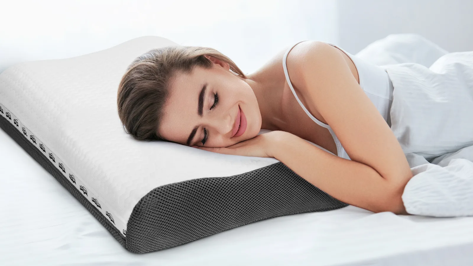 Persona que duerme de lado, apoyada en la almohada Sleepm Polar Bear